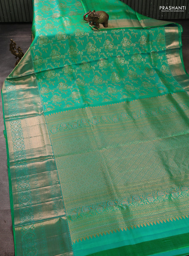 Pure kanchipuram silk saree green with allover zari woven brocade weaves and long zari woven border