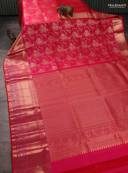 Pure kanchipuram silk saree dual shade of pinkish orange with allover zari woven brocade weaves and long zari woven border