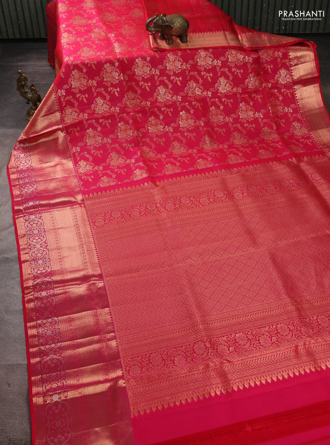 Pure kanchipuram silk saree dual shade of pinkish orange with allover zari woven brocade weaves and long zari woven border