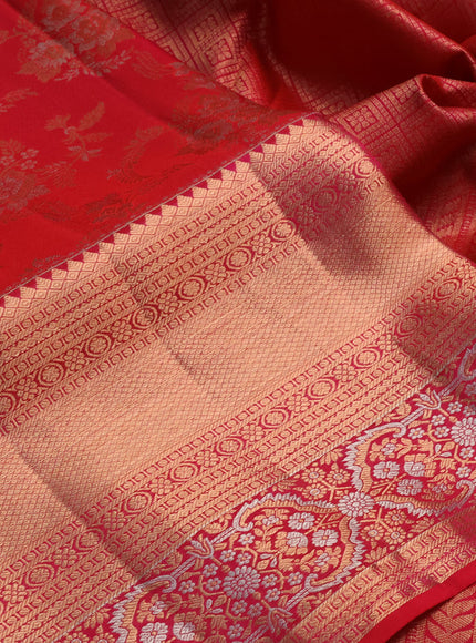Pure kanchipuram silk saree dual shade of pinkish orange with allover zari woven brocade weaves and long zari woven border
