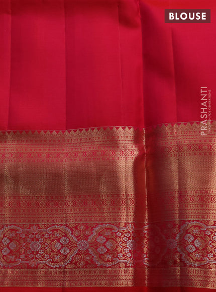 Pure kanchipuram silk saree dual shade of pinkish orange with allover zari woven brocade weaves and long zari woven border