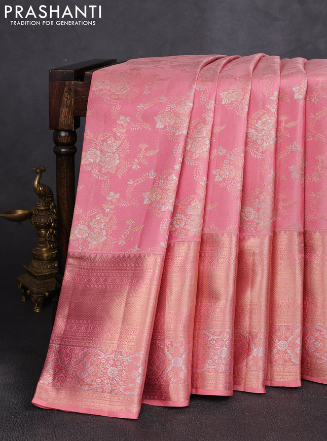 Pure kanchipuram silk saree peach shade with allover zari woven brocade weaves and long zari woven border