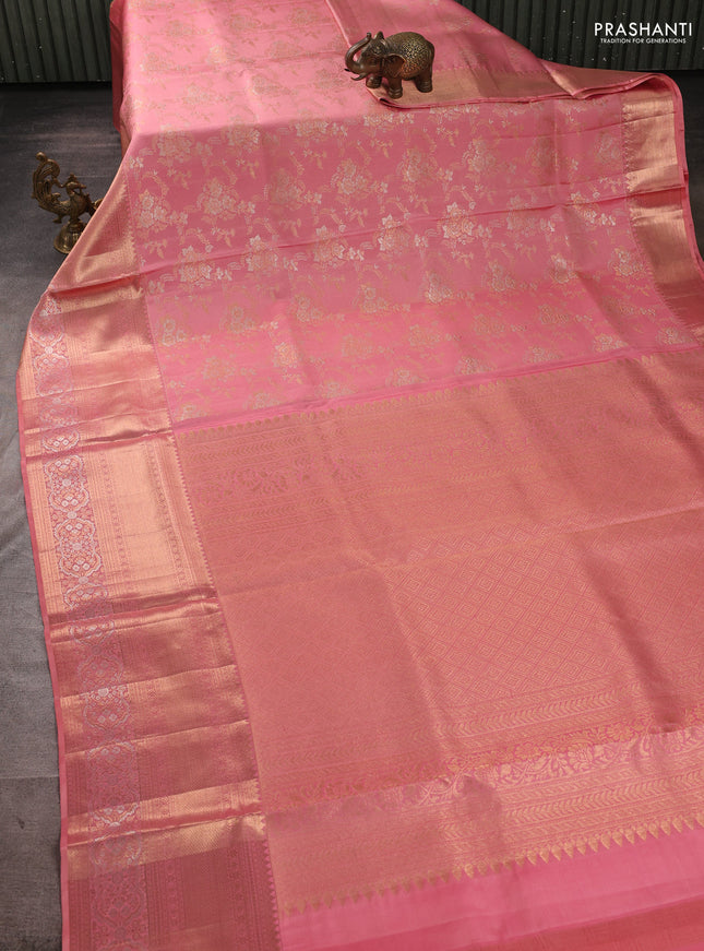 Pure kanchipuram silk saree peach shade with allover zari woven brocade weaves and long zari woven border