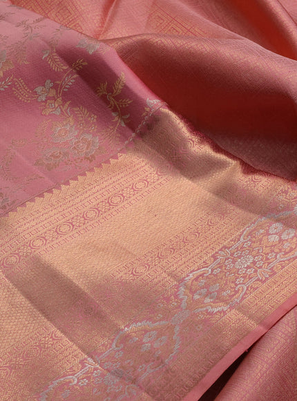 Pure kanchipuram silk saree peach shade with allover zari woven brocade weaves and long zari woven border