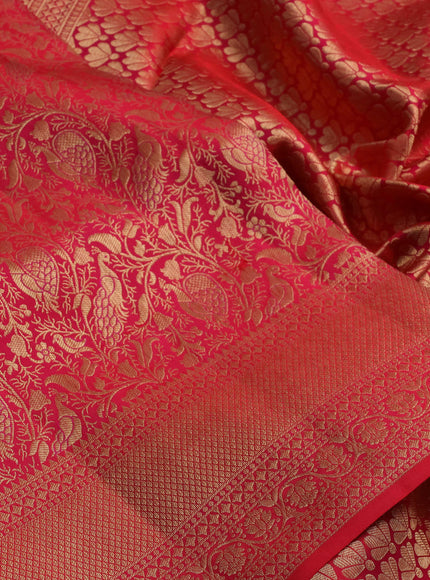 Pure kanchipuram silk saree tomato pink with allover zari woven brocade weaves and zari woven border
