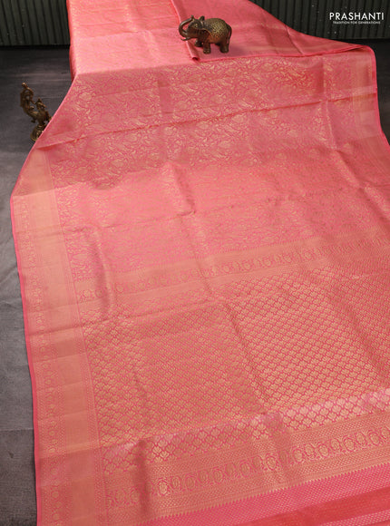 Pure kanchipuram silk saree peach shade with allover zari woven brocade weaves and zari woven border
