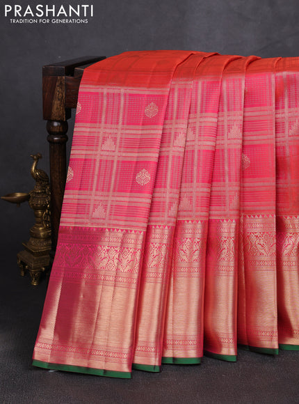 Pure kanchipuram silk saree dual shade of pinkish orange with allover zari checks & buttas and long rich zari woven border