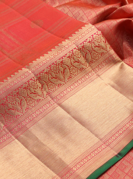 Pure kanchipuram silk saree dual shade of pinkish orange with allover zari checks & buttas and long rich zari woven border