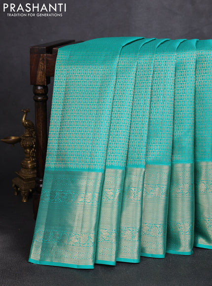 Pure kanchipuram silk saree teal green with allover zari woven brocade weaves and zari woven border