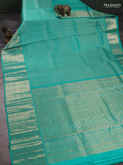 Pure kanchipuram silk saree teal green with allover zari woven brocade weaves and zari woven border