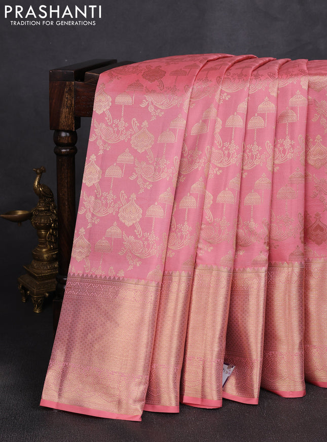 Pure kanchipuram silk saree peach shade with allover zari woven brocade weaves and zari woven border