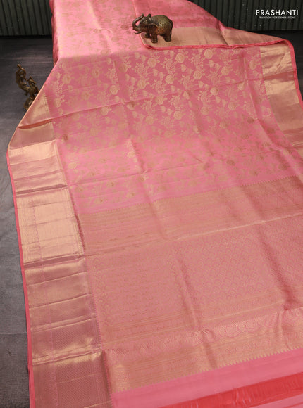 Pure kanchipuram silk saree peach shade with allover zari woven brocade weaves and zari woven border