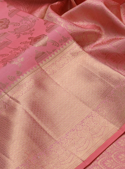 Pure kanchipuram silk saree peach shade with allover zari woven brocade weaves and zari woven border