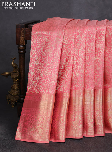 Pure kanchipuram silk saree peach shade with allover zari woven brocade weaves and long rich zari woven border