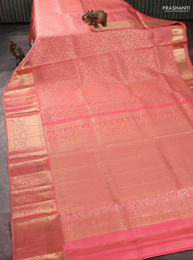 Pure kanchipuram silk saree peach shade with allover zari woven brocade weaves and long rich zari woven border