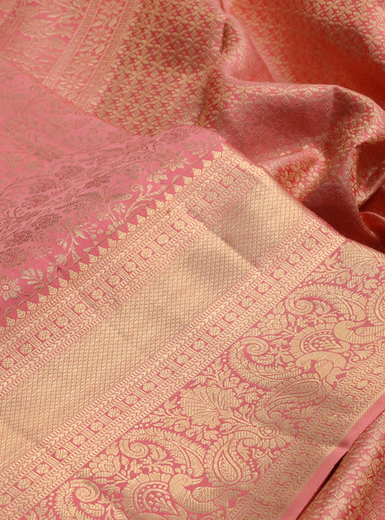 Pure kanchipuram silk saree peach shade with allover zari woven brocade weaves and long rich zari woven border