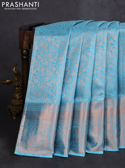 Pure kanchipuram silk saree teal blue with allover zari woven brocade weaves and long rich zari woven border