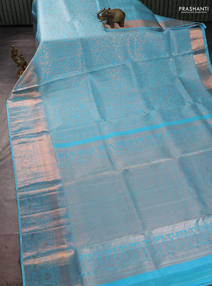 Pure kanchipuram silk saree teal blue with allover zari woven brocade weaves and long rich zari woven border