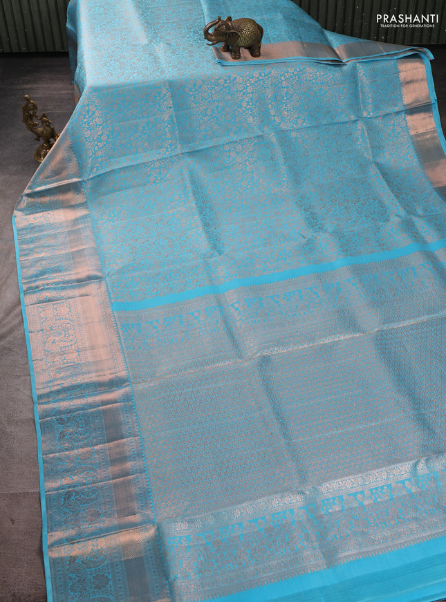 Pure kanchipuram silk saree teal blue with allover zari woven brocade weaves and long rich zari woven border