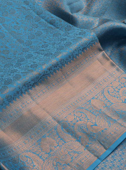 Pure kanchipuram silk saree teal blue with allover zari woven brocade weaves and long rich zari woven border