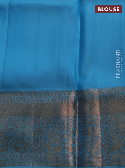 Pure kanchipuram silk saree teal blue with allover zari woven brocade weaves and long rich zari woven border