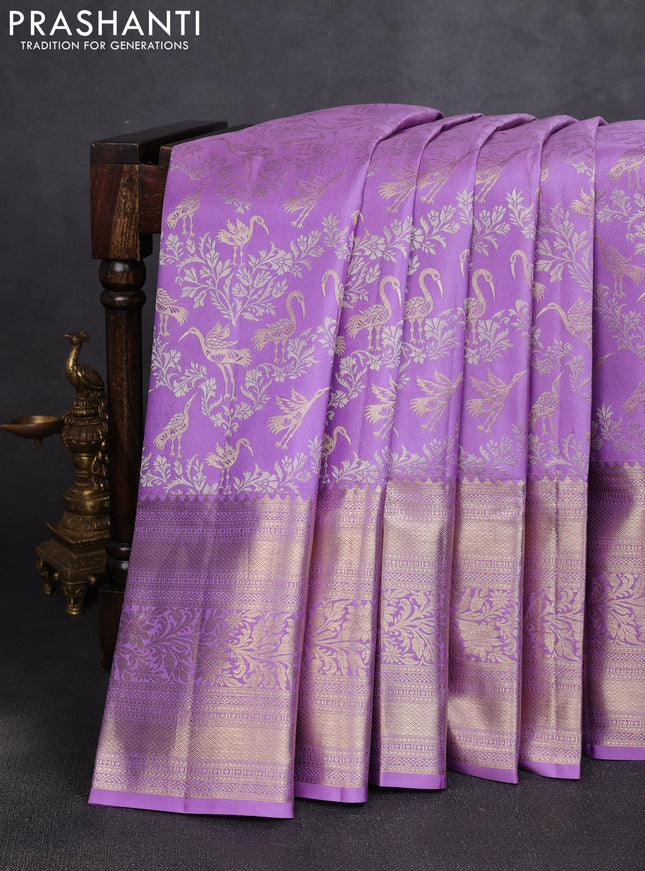 Pure kanchipuram silk saree lavender with allover zari woven brocade weaves and long zari woven border