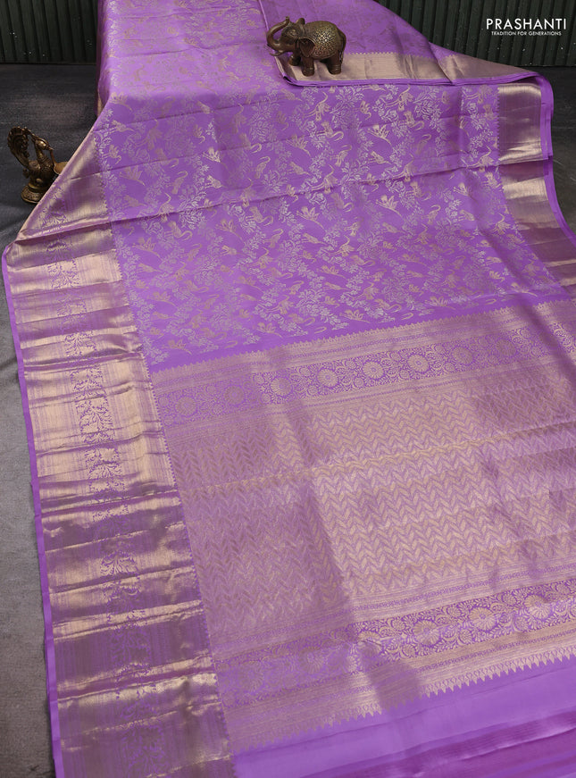 Pure kanchipuram silk saree lavender with allover zari woven brocade weaves and long zari woven border