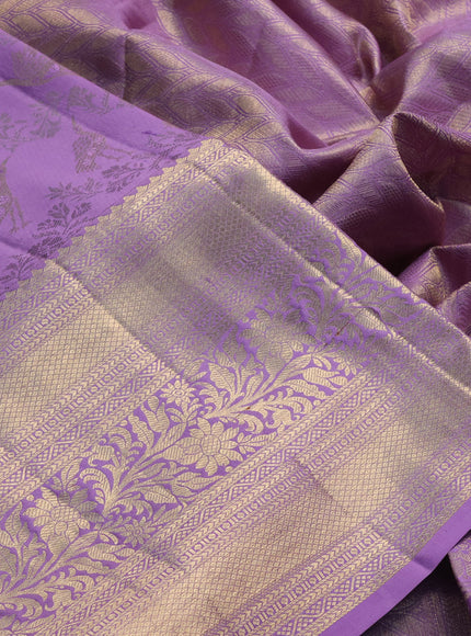 Pure kanchipuram silk saree lavender with allover zari woven brocade weaves and long zari woven border