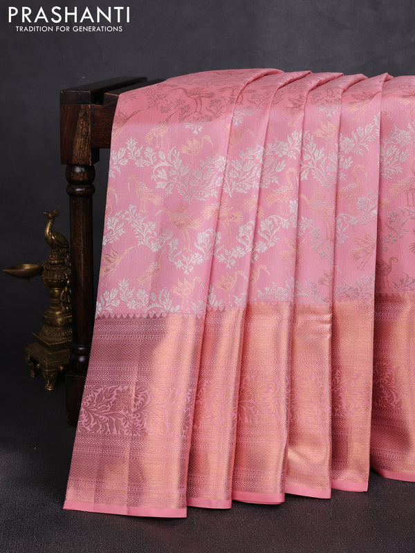 Pure kanchipuram silk saree peach shade with allover zari woven brocade weaves and long zari woven border