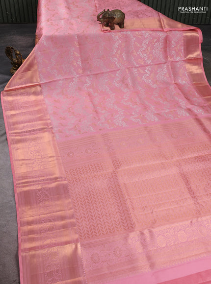 Pure kanchipuram silk saree peach shade with allover zari woven brocade weaves and long zari woven border