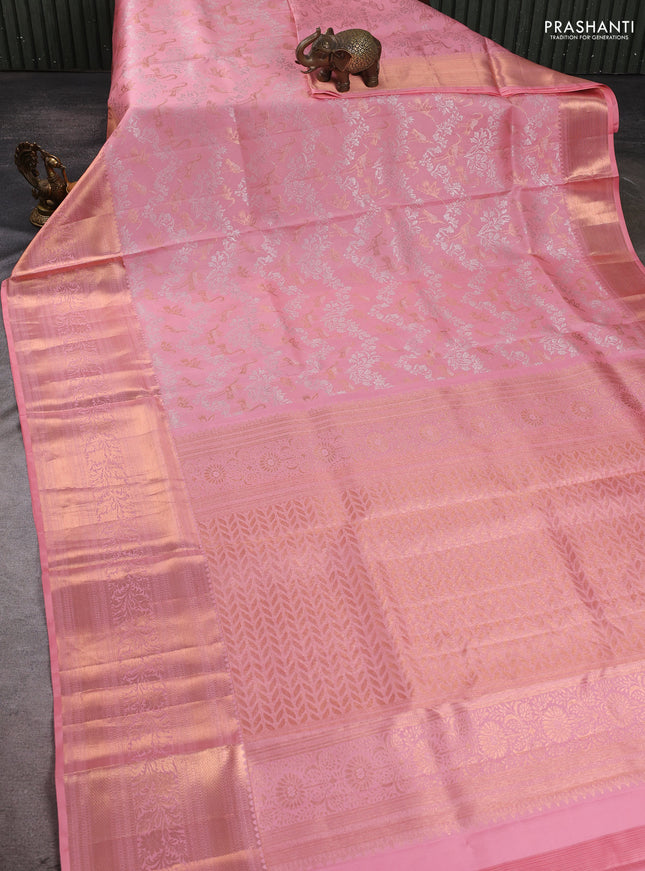 Pure kanchipuram silk saree peach shade with allover zari woven brocade weaves and long zari woven border