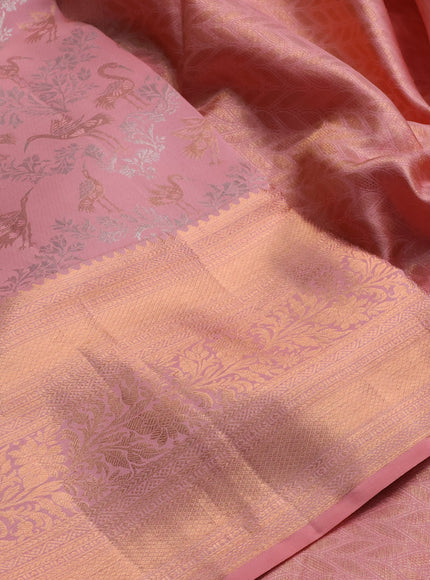 Pure kanchipuram silk saree peach shade with allover zari woven brocade weaves and long zari woven border