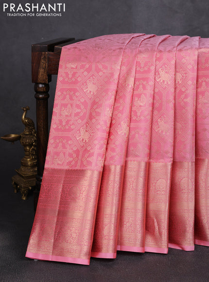 Pure kanchipuram silk saree peach pink with allover zari woven brocade weaves and long zari woven border