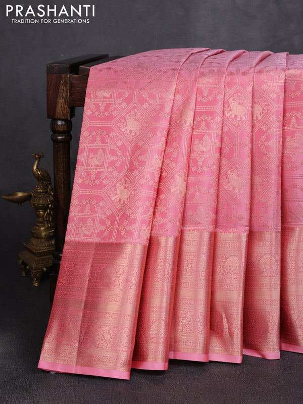 Pure kanchipuram silk saree peach pink with allover zari woven brocade weaves and long zari woven border