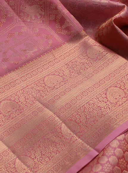 Pure kanchipuram silk saree peach pink with allover zari woven brocade weaves and long zari woven border