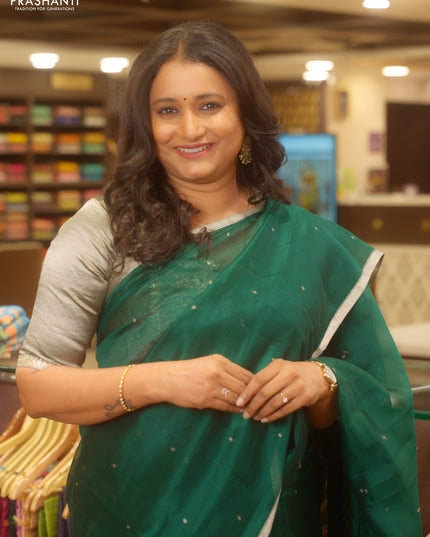 Pure Organza silk saree bottle green with zari woven buttas and zari woven piping border