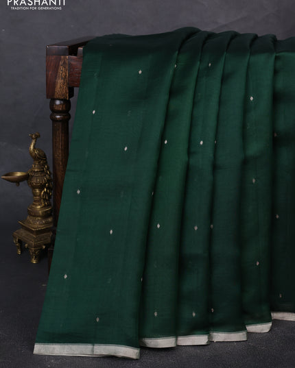 Pure Organza silk saree bottle green with zari woven buttas and zari woven piping border