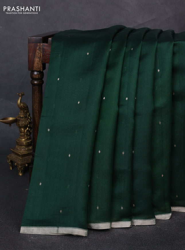 Pure Organza silk saree bottle green with zari woven buttas and zari woven piping border