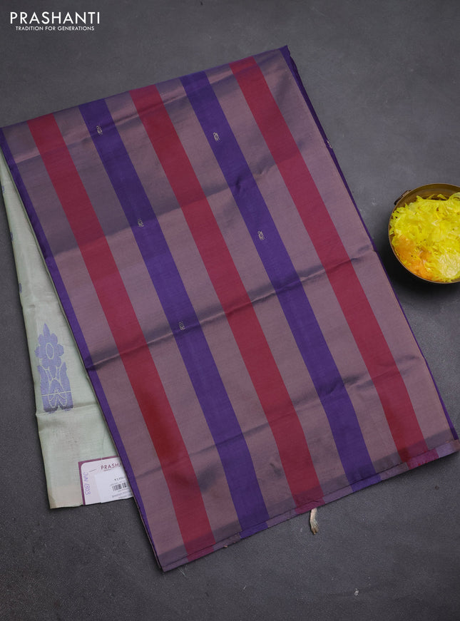 Banana pith saree multi colour and pastel green with allover stripe pattern & thread buttas in borderless style