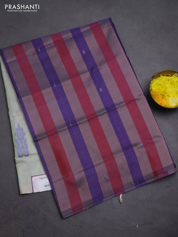 Banana pith saree multi colour and pastel green with allover stripe pattern & thread buttas in borderless style