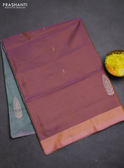 Banana pith saree dual shade of peach shade and green with thread woven buttas and simple border