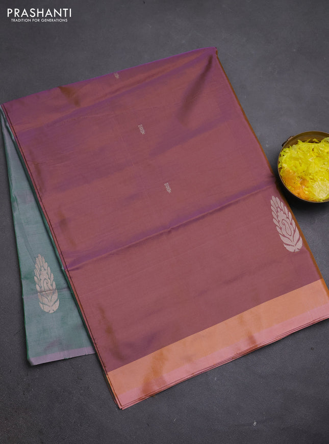 Banana pith saree dual shade of peach shade and green with thread woven buttas and simple border