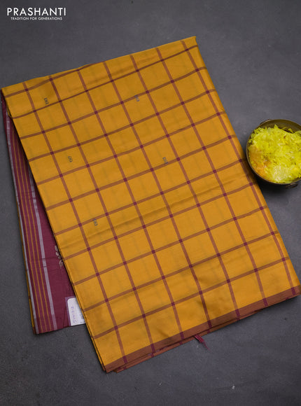 Banana pith saree mustard yellow and maroon with allover checks & thread woven buttas and piping border