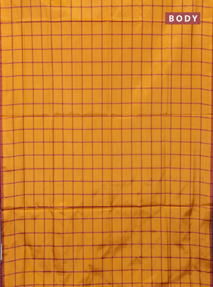 Banana pith saree mustard yellow and maroon with allover checks & thread woven buttas and piping border