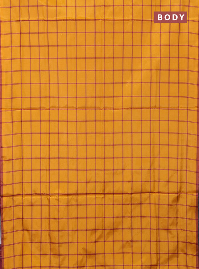 Banana pith saree mustard yellow and maroon with allover checks & thread woven buttas and piping border