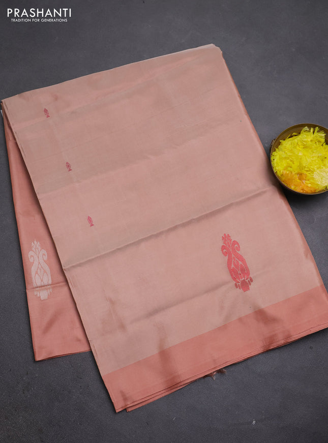 Banana pith saree peach shade with thread woven buttas and simple border