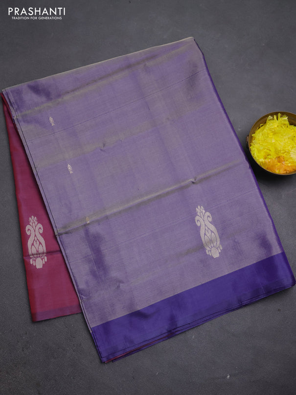 Banana pith saree dual shade of blue and maroon with thread woven buttas and simple border