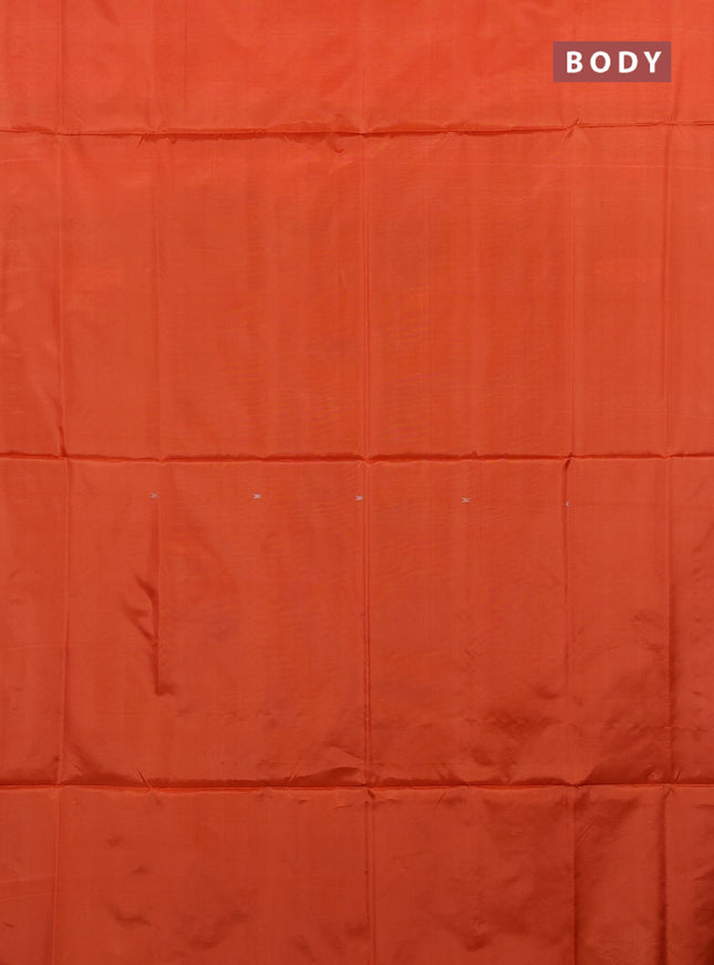 Banana pith saree orange and black with thread woven buttas in borderless style