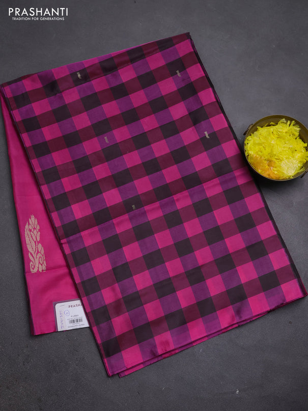 Banana pith saree black and pink with allover checks & thread buttas in borderless style