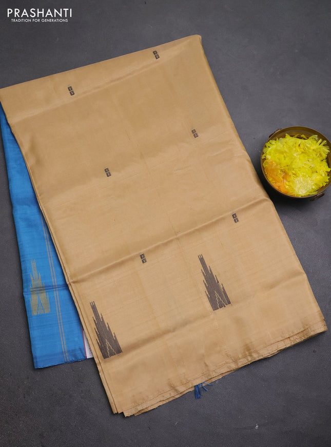Banana pith saree sandal and teal blue with thread woven buttas in borderless style